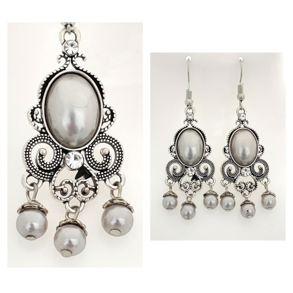Pearly statement earrings